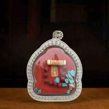 Silver-Cased Yellow Jambhala for protection