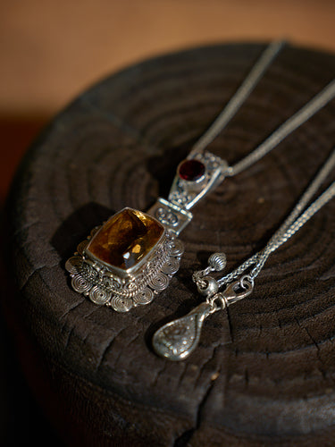 Radiance of Prosperity Pendant with Citrine – A Himalayan Symbol of Wealth and Spiritual Abundance