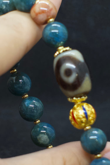 Agatized Coral Three-Eyed Dzi Bead Silver Energy Bracelet