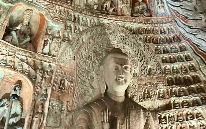 The Spiritual Significance of Yungang Grottoes Tryadhva-buddha Statue