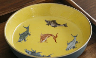 The Abundant Waters: Celebrating Prosperity and Fortune Symbolized by Fish on Ceramics