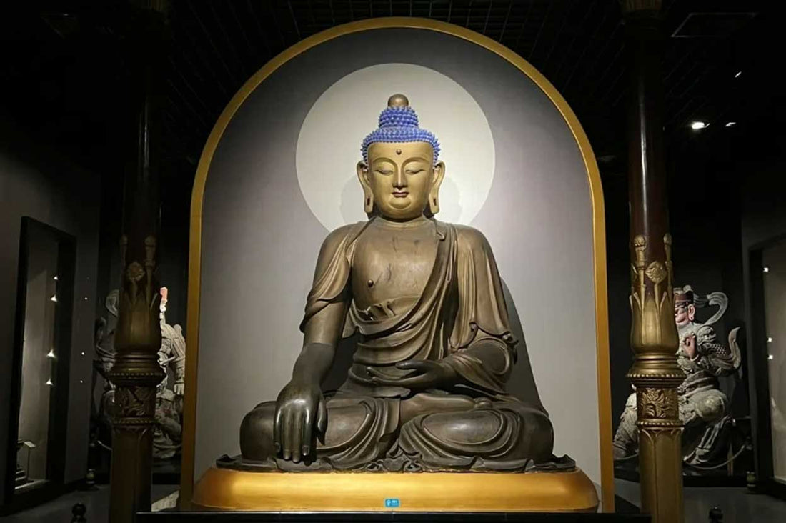 A Point of Focus for Meditation and Contemplation: The Eight Auspicious Symbols Placed on Lotus Pedestals in Front of Statues of the Buddha