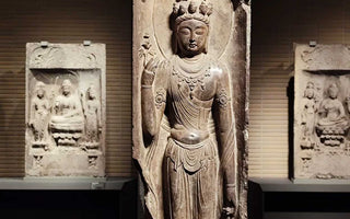 The Cultural Heritage: Tang Dynasty Stone Buddha with Backrest
