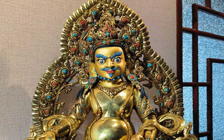 Brushstrokes of Tranquility: Painting the Purple Copper  Buddha Statue