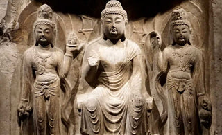 The Serene Icons: Tang Dynasty Grey Limestone Buddha