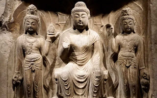 The Serene Icons: Tang Dynasty Grey Limestone Buddha