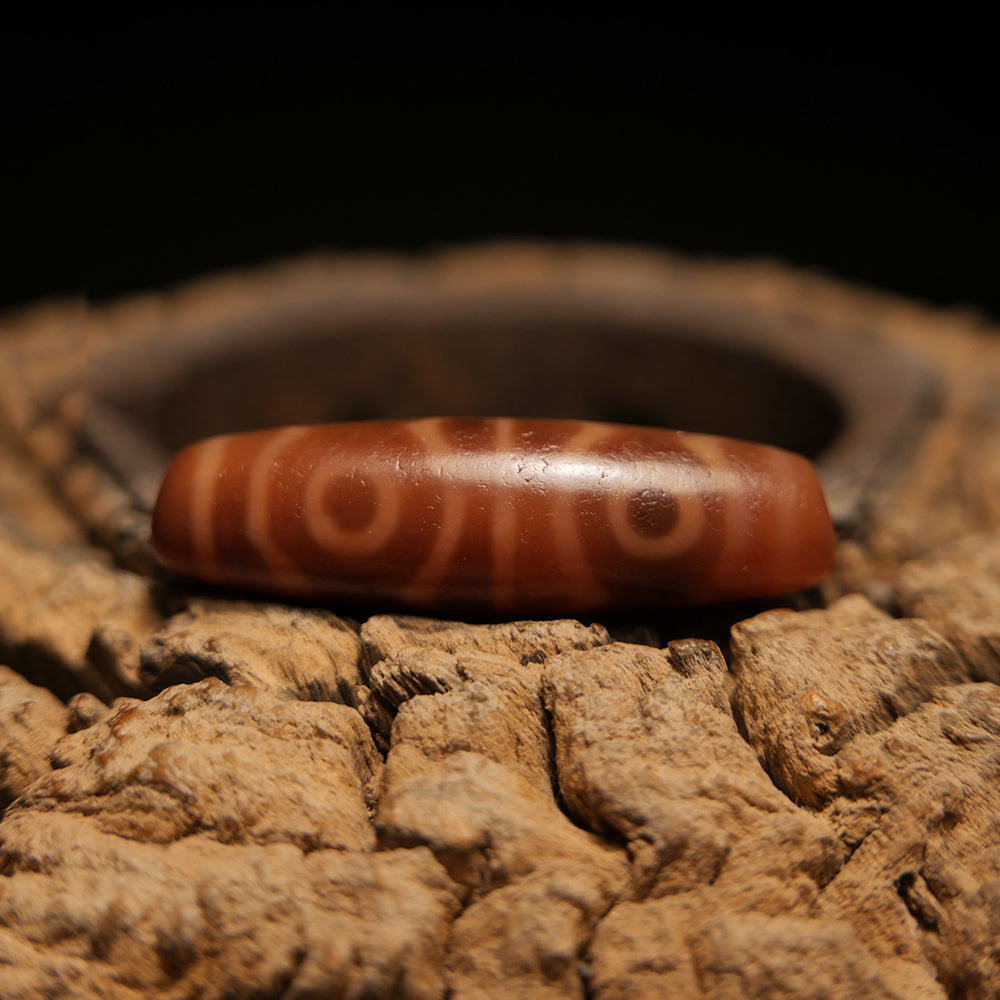 Fortune-Infused Six-Eye Orange Dzi Pendant