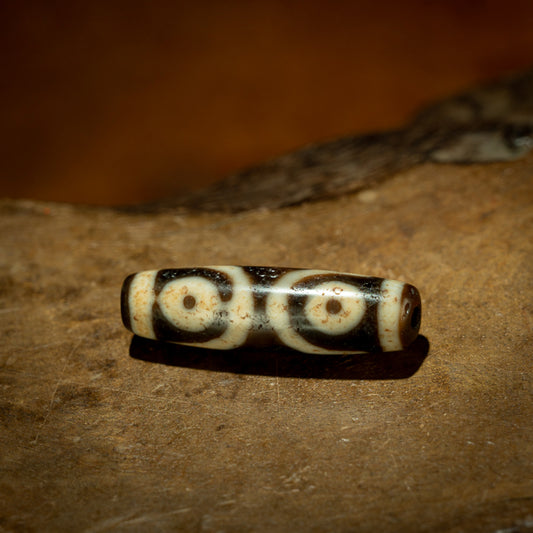 Three-Eye Ancient Dzi Bead Pendant for Protection and Prosperity