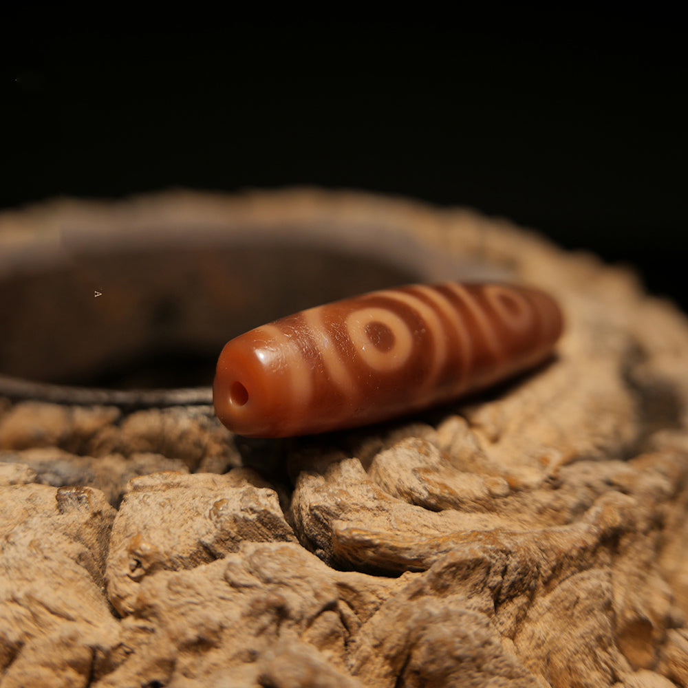 Fortune-Infused Six-Eye Orange Dzi Pendant