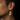AI lifestyle product image - earring on male ear