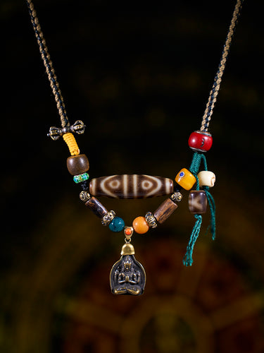 Flowing Fortune Water-Pattern Eight-Eyed Agate Dzi Pendant