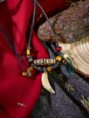 Illuminated Wisdom Phoenix-Eye Four-Eyed Agate Dzi Pendant