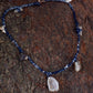 Serene Balance Crystal Fossil Necklace with Indigo Dyed Cord