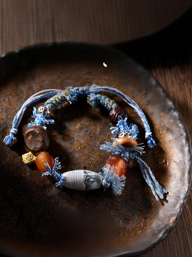 Himalayan Style Woven Cord Dzi Bead Silver Zakirum Bracelet