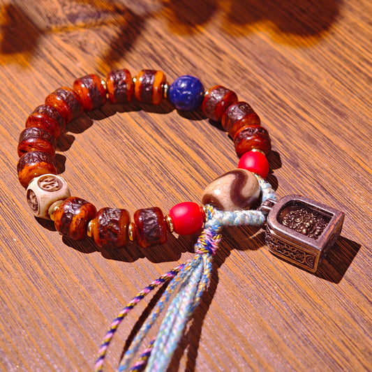 Tiger Tooth Agate Bracelet – Powerful Energy with Tibetan Beads and Handcrafted Design