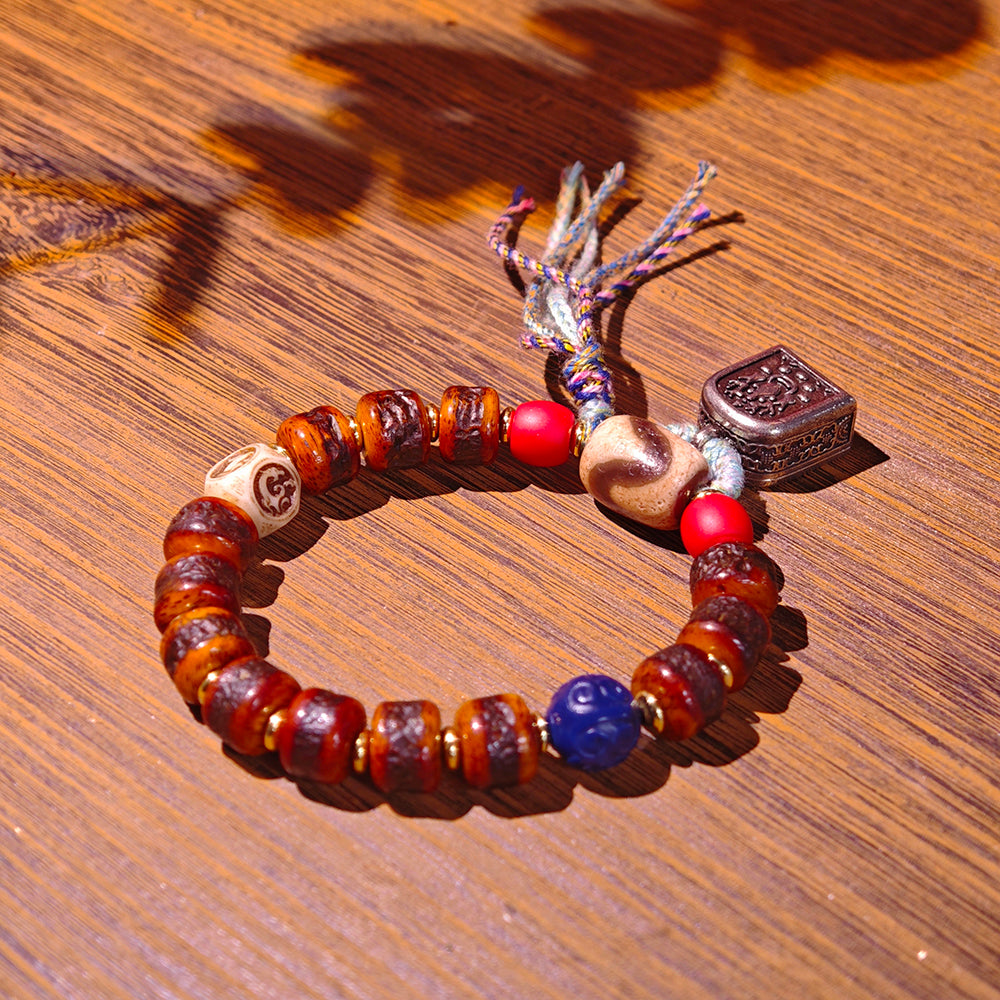 Tiger Tooth Agate Bracelet – Powerful Energy with Tibetan Beads and Handcrafted Design