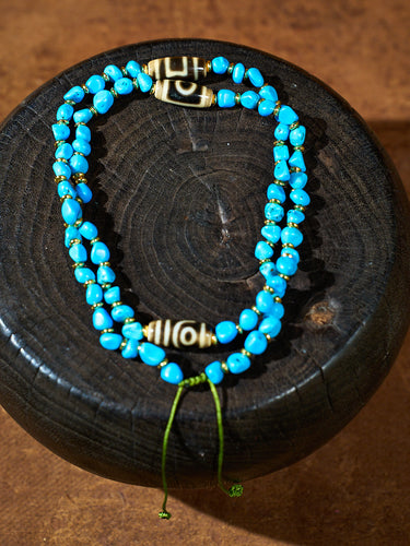 Twin Eye Destiny Thread · Two-Eyed Dzi Necklace
