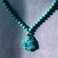 "Phoenix Energy Turquoise Necklace with Hand-Carved Tibetan Craftsmanship"