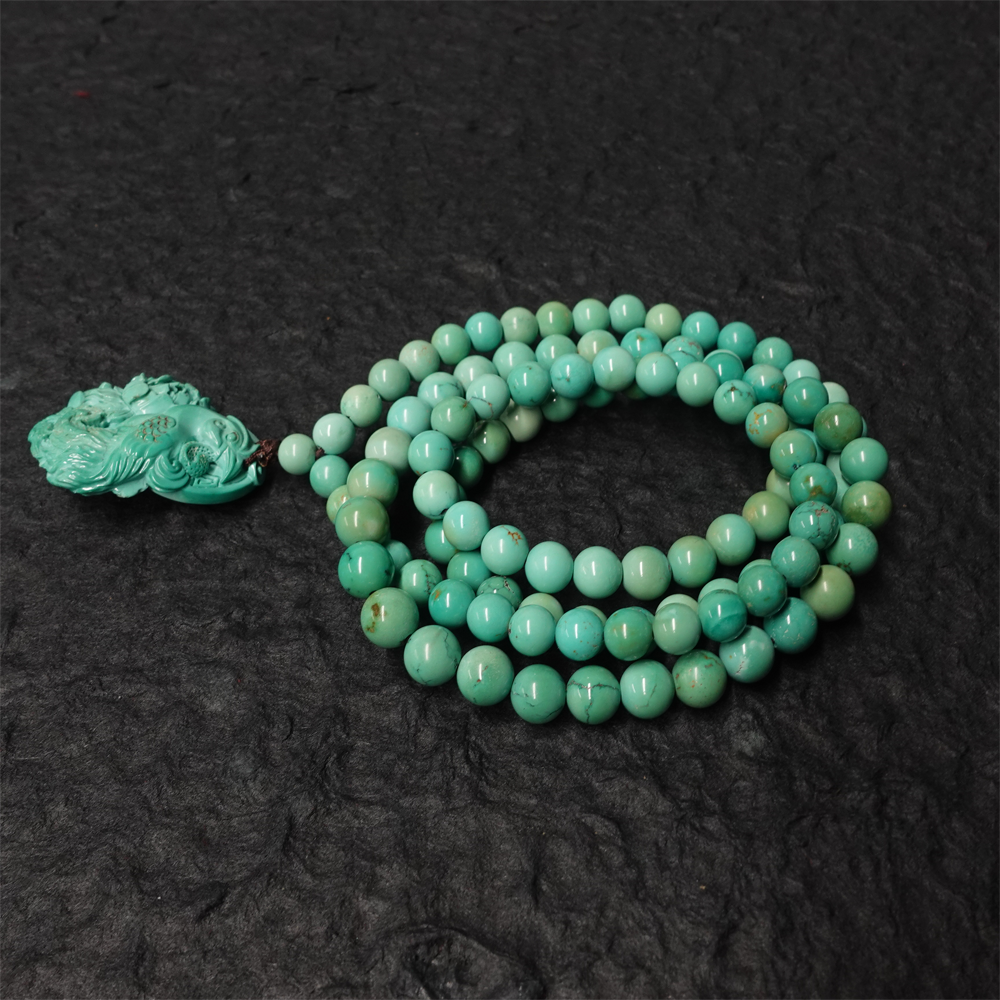 "Phoenix Energy Turquoise Necklace with Hand-Carved Tibetan Craftsmanship"