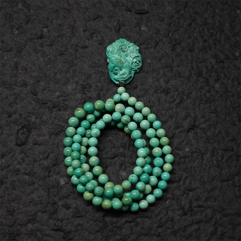 "Phoenix Energy Turquoise Necklace with Hand-Carved Tibetan Craftsmanship"