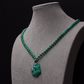 "Phoenix Energy Turquoise Necklace with Hand-Carved Tibetan Craftsmanship"