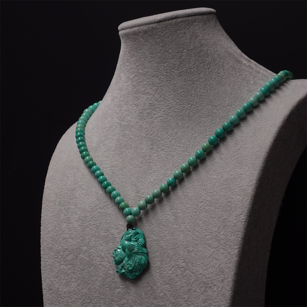 "Phoenix Energy Turquoise Necklace with Hand-Carved Tibetan Craftsmanship"