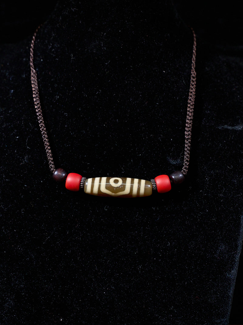 Earth & Bone Three-Eyed Dzi Bead Necklace – Tibetan Symbol of Protection & Spiritual Balance