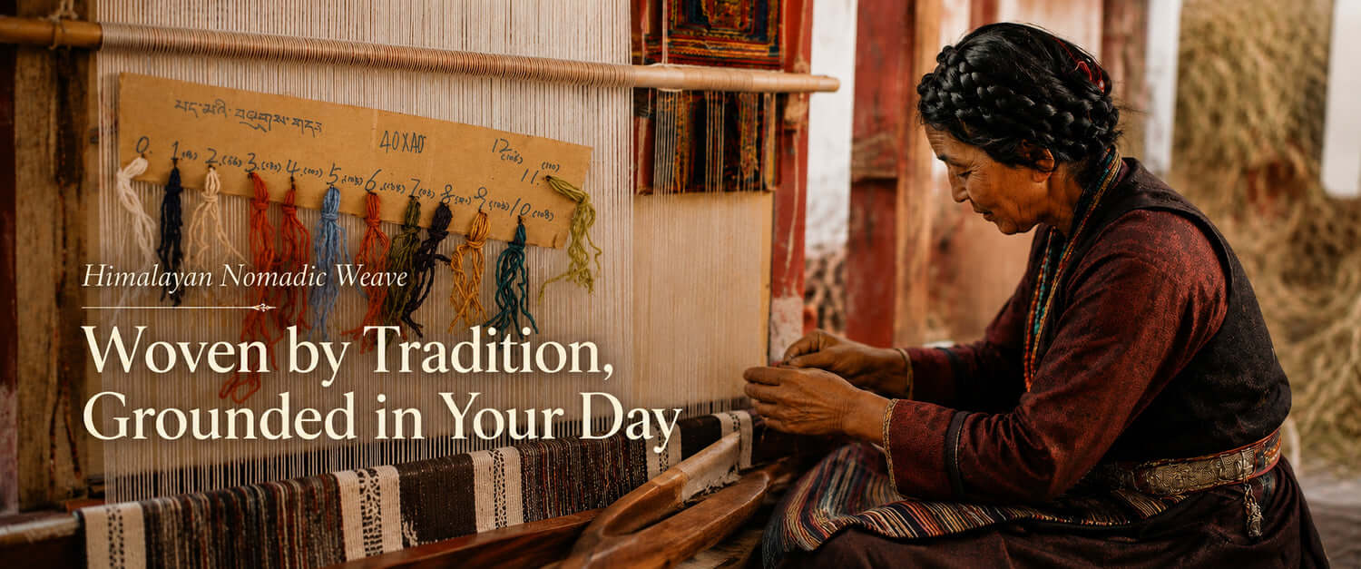 A woman in traditional clothing sits at a wooden loom weaving fabric, with a textile panel and the text 'Woven by Tradition, Grounded in Your Day' overlaid on the left side.