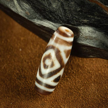 Tibetan Hollow Tiger-Tooth Double Vajra-Eye Central-Eye Dzi Bead from Tibet