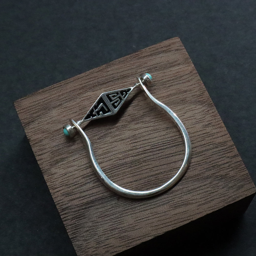Turquoise Protection Ring with Silver Triangle Design