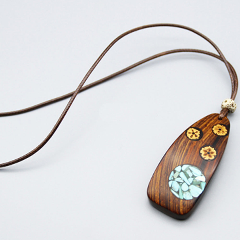 Revealed Wealth Unveiled Turquoise Pendant