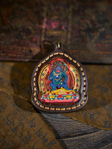 Dual Blessing Yellow and Black Dzambhala Tsa Tsa Leather Pendant