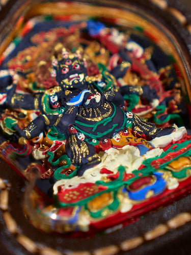 Fierce Protection Six-Armed Mahakala Tsa Tsa Leather Pendant