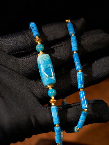 Cerulean Rhythm Agatized Corale Necklace