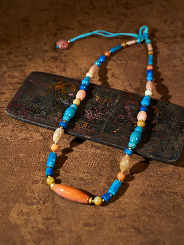 Harmonic Ground Tibetan Agatized Corale Necklace