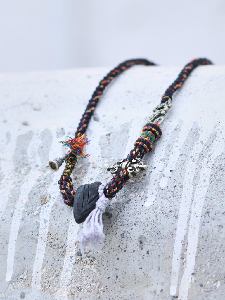 Black Tsa-Tsa Thokcha Charm Braided Necklace