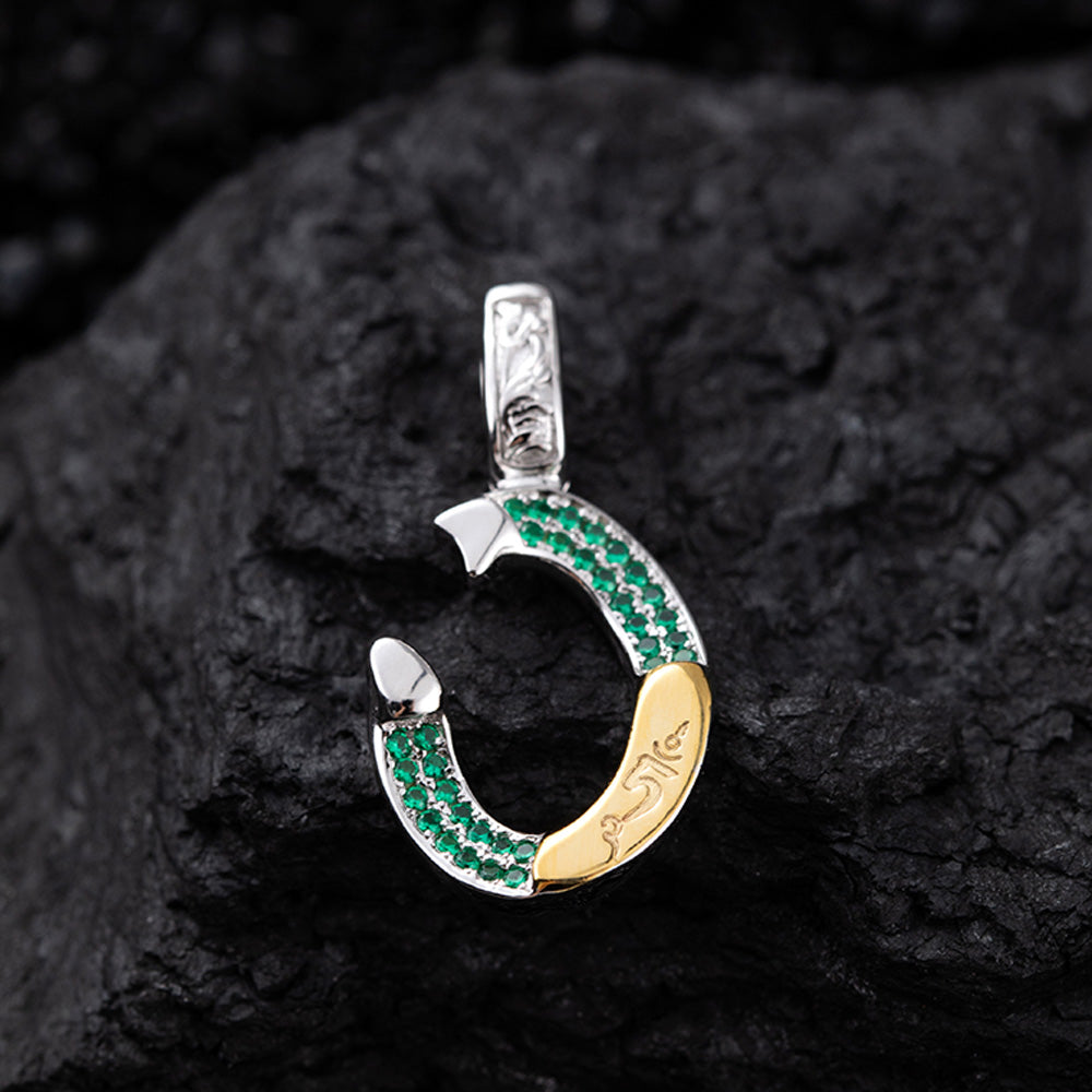 Emerald Shield Silver Pendant Handcrafted for Protection and Strength