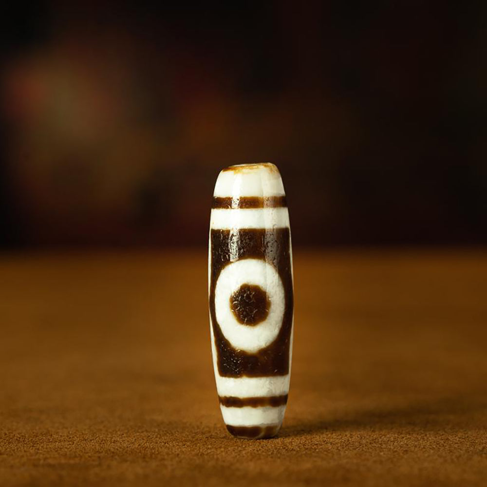 Triple-Eye Dzi Pendant – Prosperity and Energy Amulet