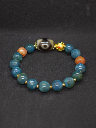 Agatized Coral Three-Eyed Dzi Bead Silver Energy Bracelet