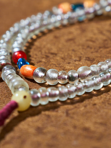 Silent Light of Devotion · Old Tibetan Colored Glaze Bracelet