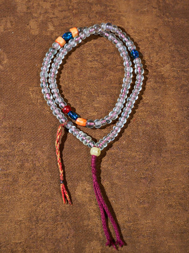 Silent Light of Devotion · Old Tibetan Colored Glaze Bracelet