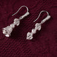 Harmony Bell Silver Drop Earrings Handcrafted for Spiritual Prosperity