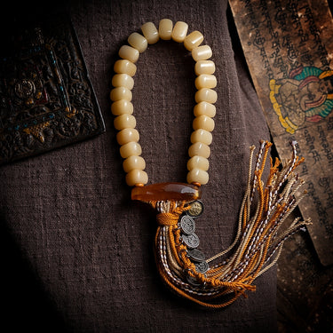Handcrafted Camel Bone Prayer Bead Bracelet – Intricate Carving and Symbol of Good Fortune