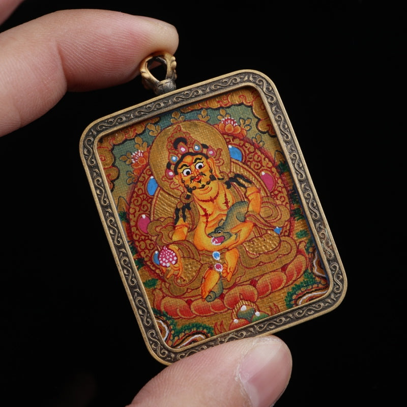 Yellow Jambhala Tibetan Thangka Pendant with Vajra Shell puretibetan