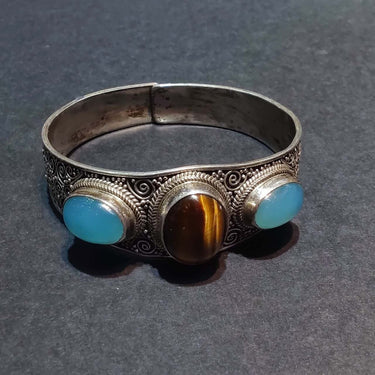 Tranquil Strength Bracelet | Pure Silver Bangle with Aquamarine and Tiger Eye for Calm and Protection - Kailash Energy