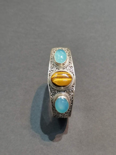 Tranquil Strength Bracelet | Pure Silver Bangle with Aquamarine and Tiger Eye for Calm and Protection - Kailash Energy