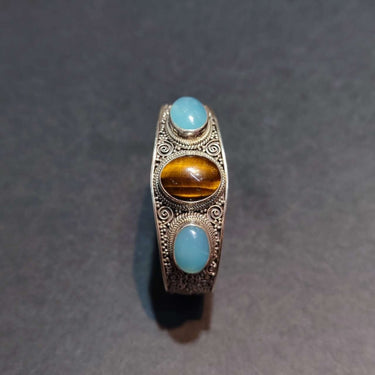 Tranquil Strength Bracelet | Pure Silver Bangle with Aquamarine and Tiger Eye for Calm and Protection - Kailash Energy